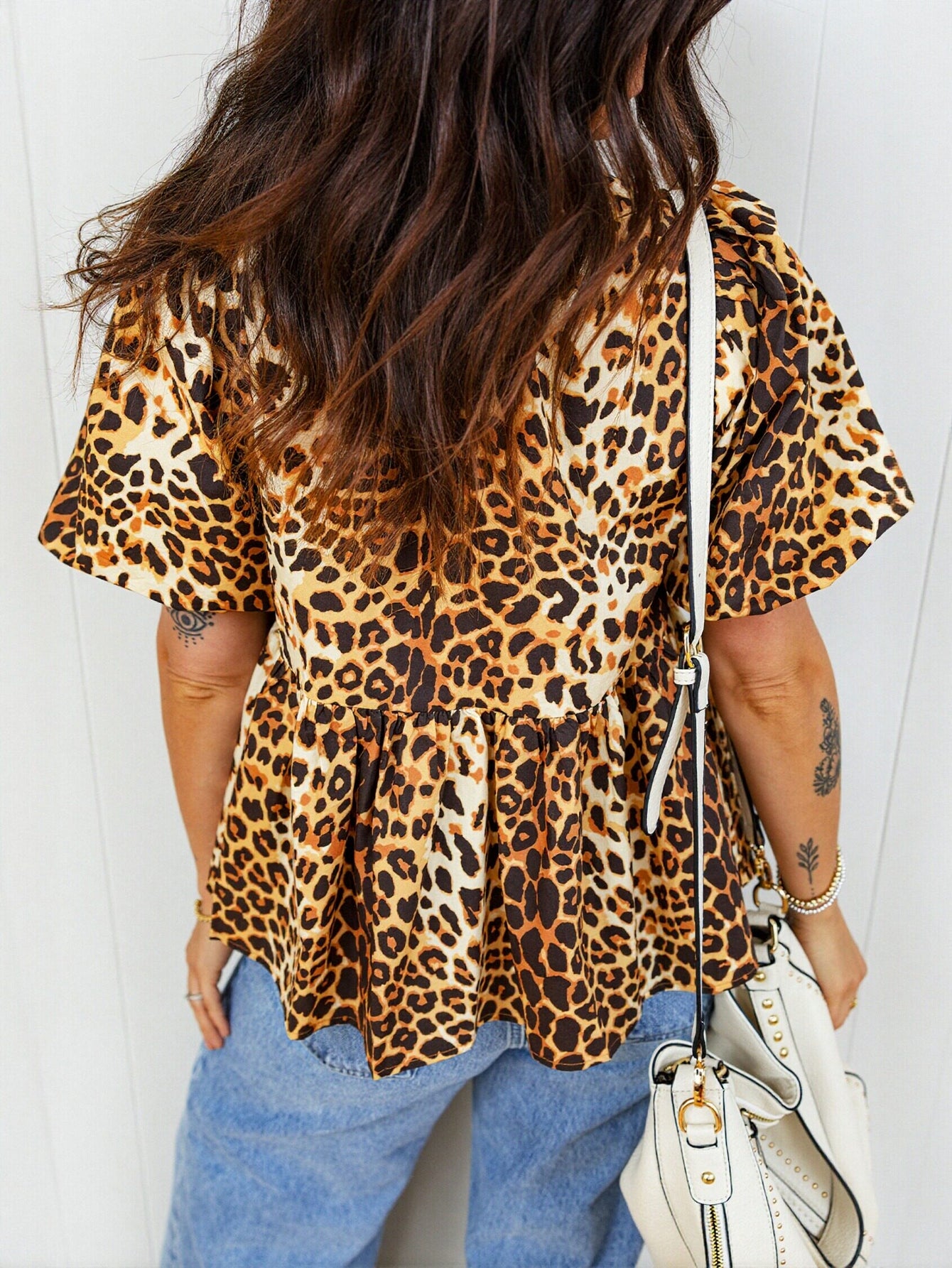 Leopard Print Puff Sleeve Peplum Top