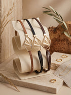 Elegant Gold Geometric Skinny Belt