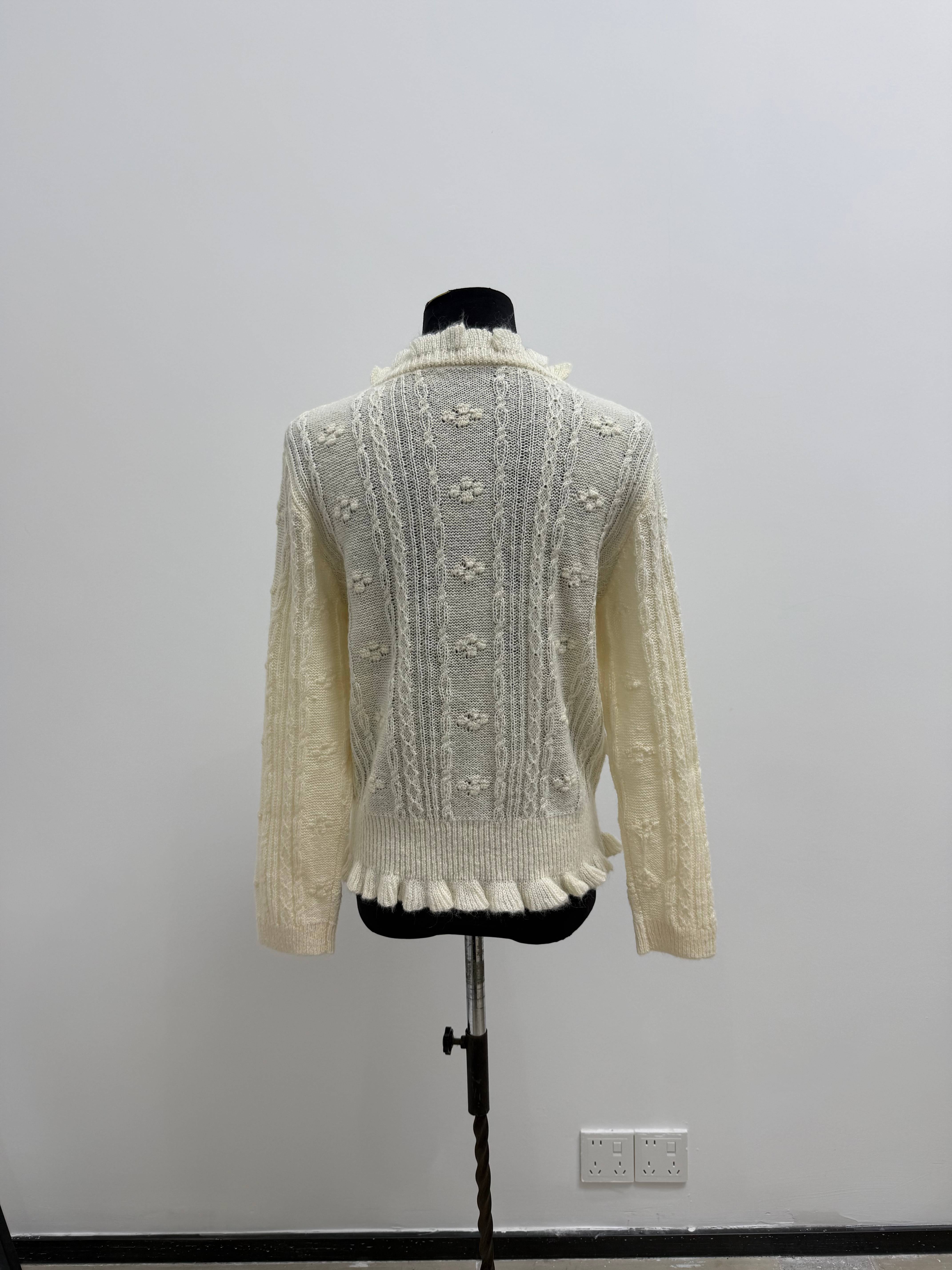Ruffled Mock Neck Cable Knit Sweater